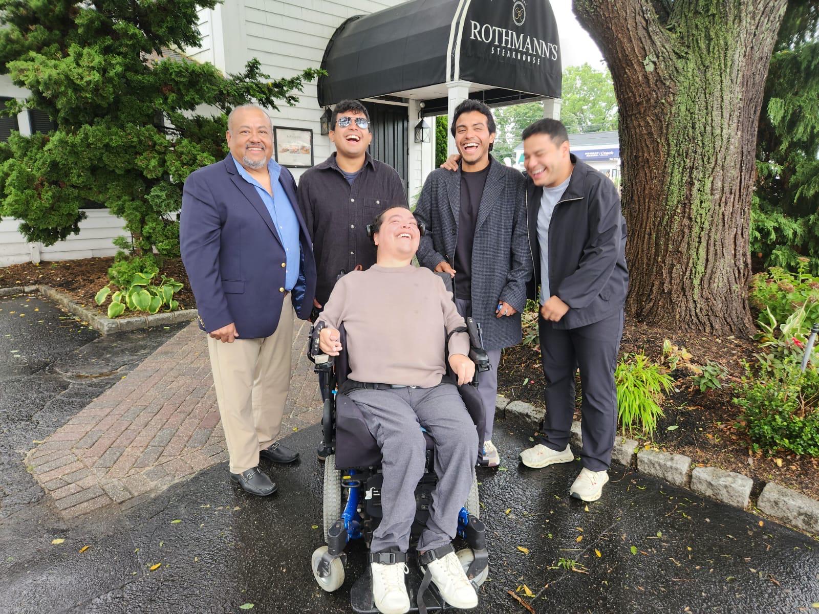 Raul with his brothers outside Rothmann's Steakhouse